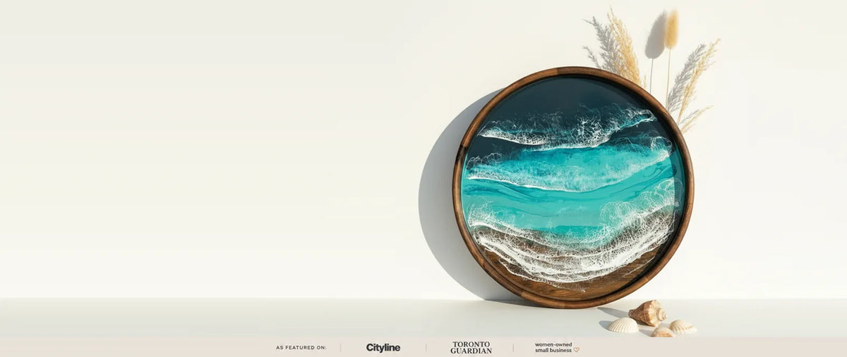 Ocean-inspired handmade resin art pieces arranged in soft natural light